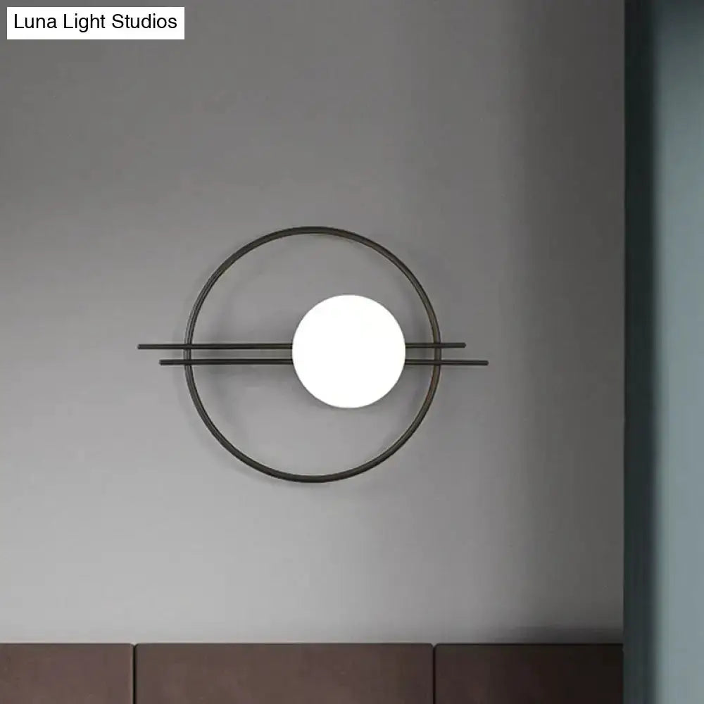 Black and Brass Sconce Light with White Glass
