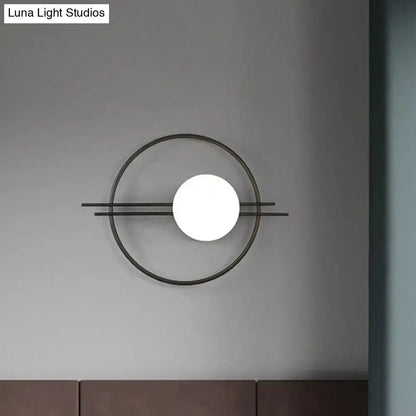 Black and Brass Sconce Light with White Glass