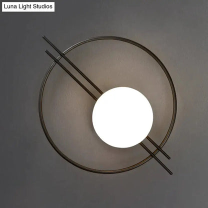 Black and Brass Sconce Light with White Glass
