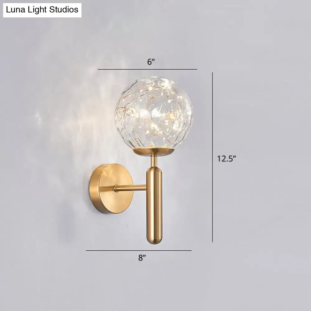 Black Glass Wall Sconce with brass finish and crackle glass globe by Decorbites on Tampa Home & Garden Store