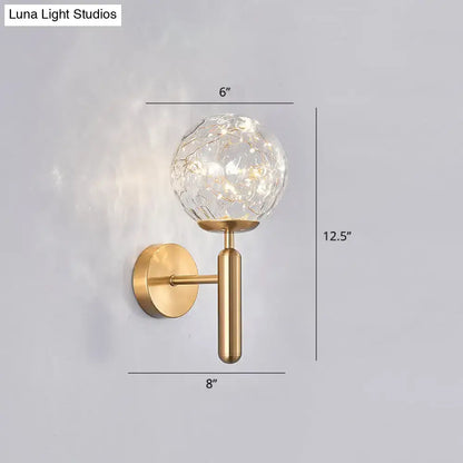 Black Glass Wall Sconce with brass finish and crackle glass globe by Decorbites on Tampa Home & Garden Store