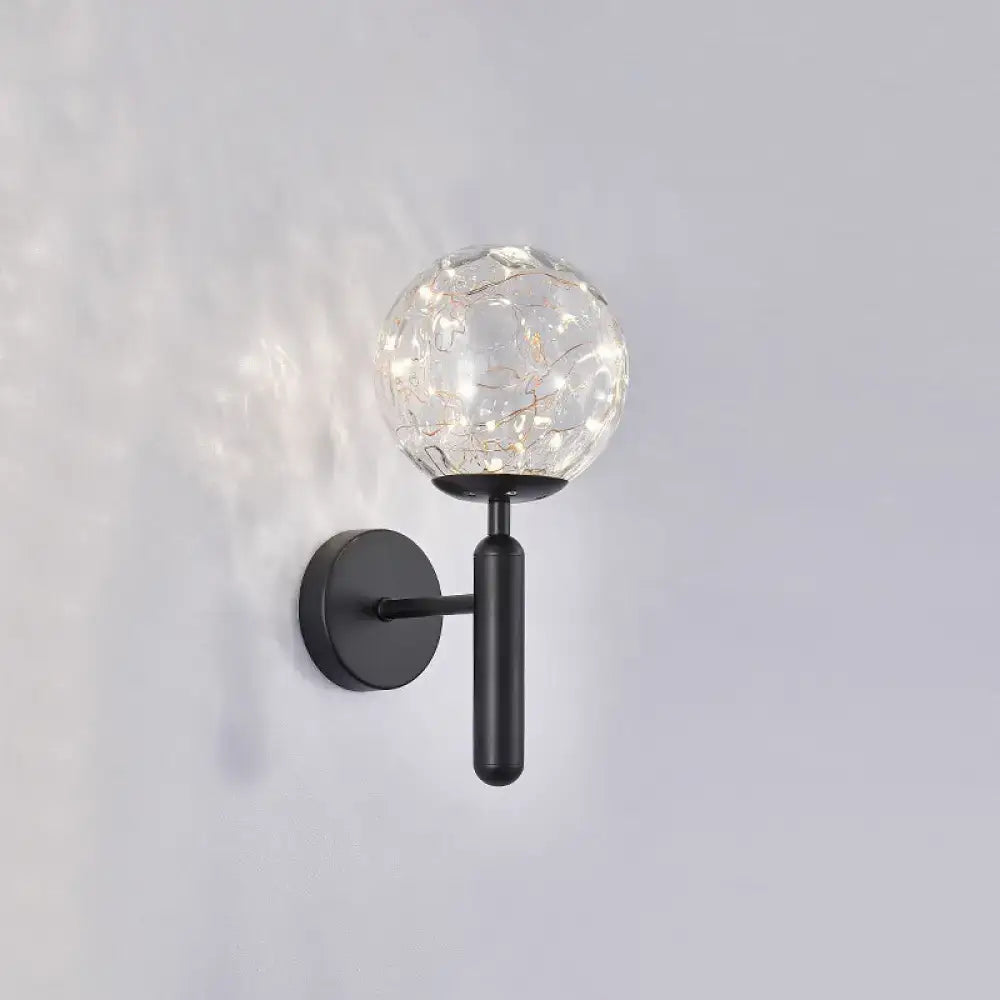 Black glass wall sconce with clear crackle globe, black metal mount and cylindrical arm on Tampa Home & Garden Store