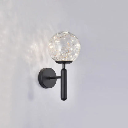 Black glass wall sconce with clear crackle globe, black metal mount and cylindrical arm on Tampa Home & Garden Store