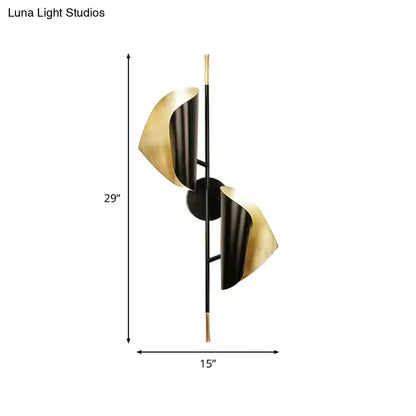 Decorbites black metal sheet sconce dual-light with gold-toned curved panels on Tampa Home & Garden Store