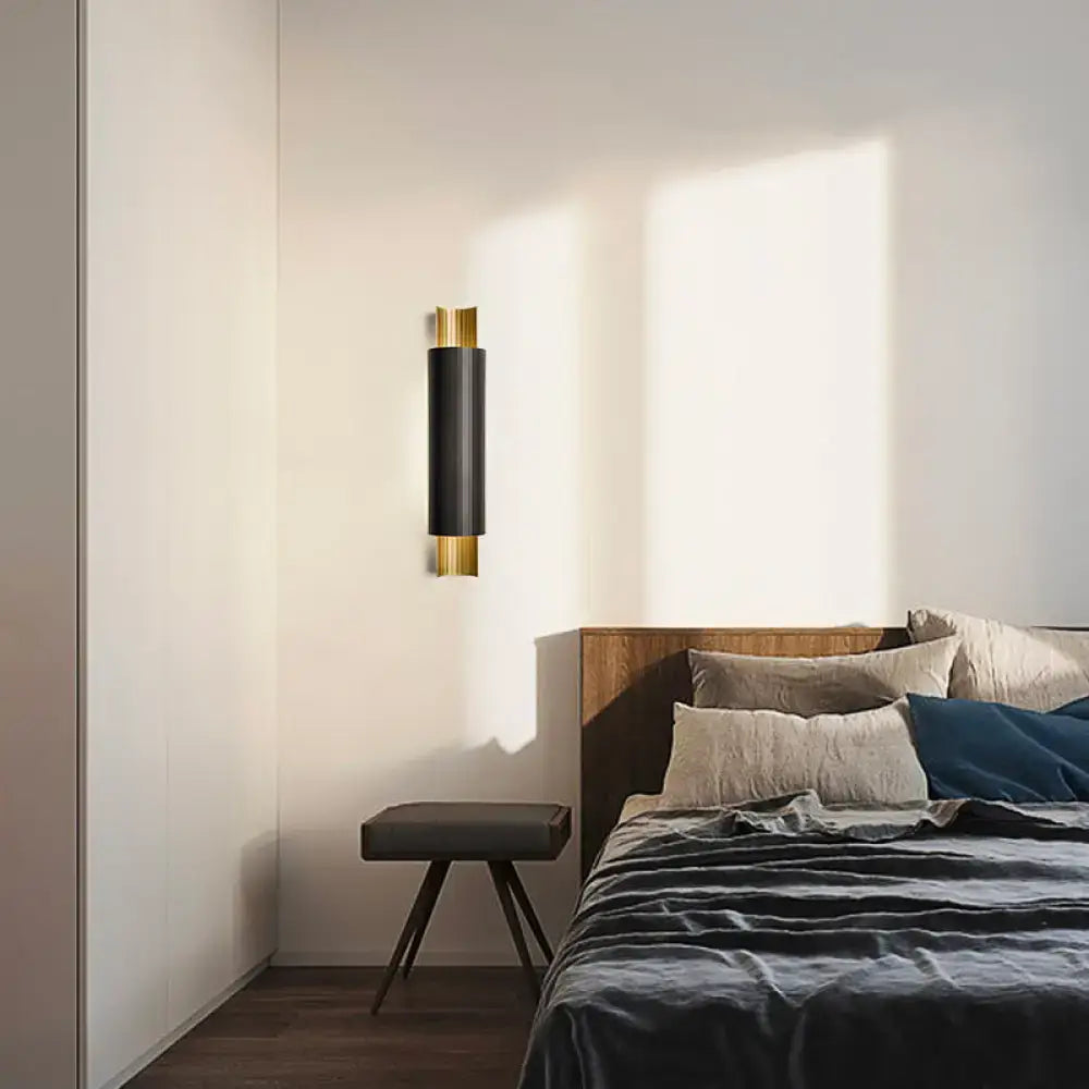 Black Gold Pipe LED Sconce, black cylindrical body with gold caps, wall mounted by Decorbites on Tampa Home & Garden Store
