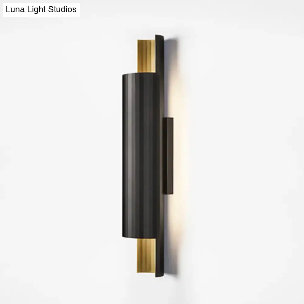 Black Gold Pipe LED Sconce by Decorbites, black metal pipe with gold accents, wall-mounted on Tampa Home & Garden Store