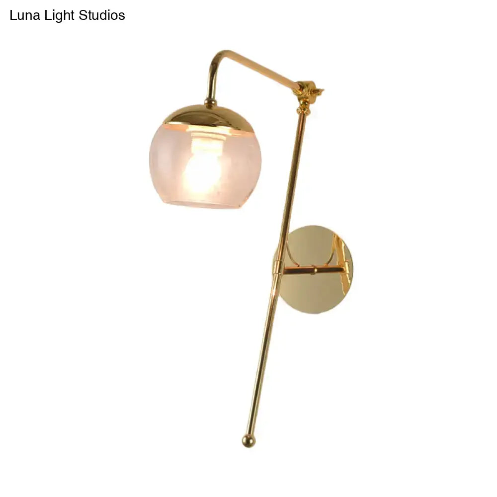 Black Glass Swing Arm Sconce with brass finish and pink glass shade on Tampa Home & Garden Store
