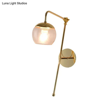 Black Glass Swing Arm Sconce with brass finish and pink glass shade on Tampa Home & Garden Store