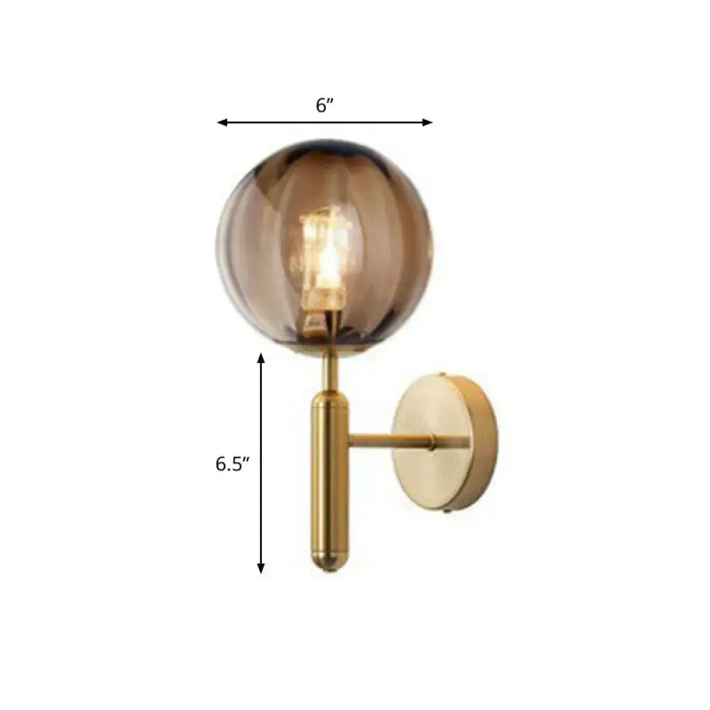 Postmodern black gold wall sconce with glass globe by Decorbites brass for bedroom lighting on Tampa Home & Garden Store
