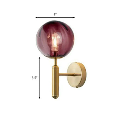 Postmodern wall sconce with purple glass globe and brass gold finish by Decorbites on Tampa Home & Garden Store