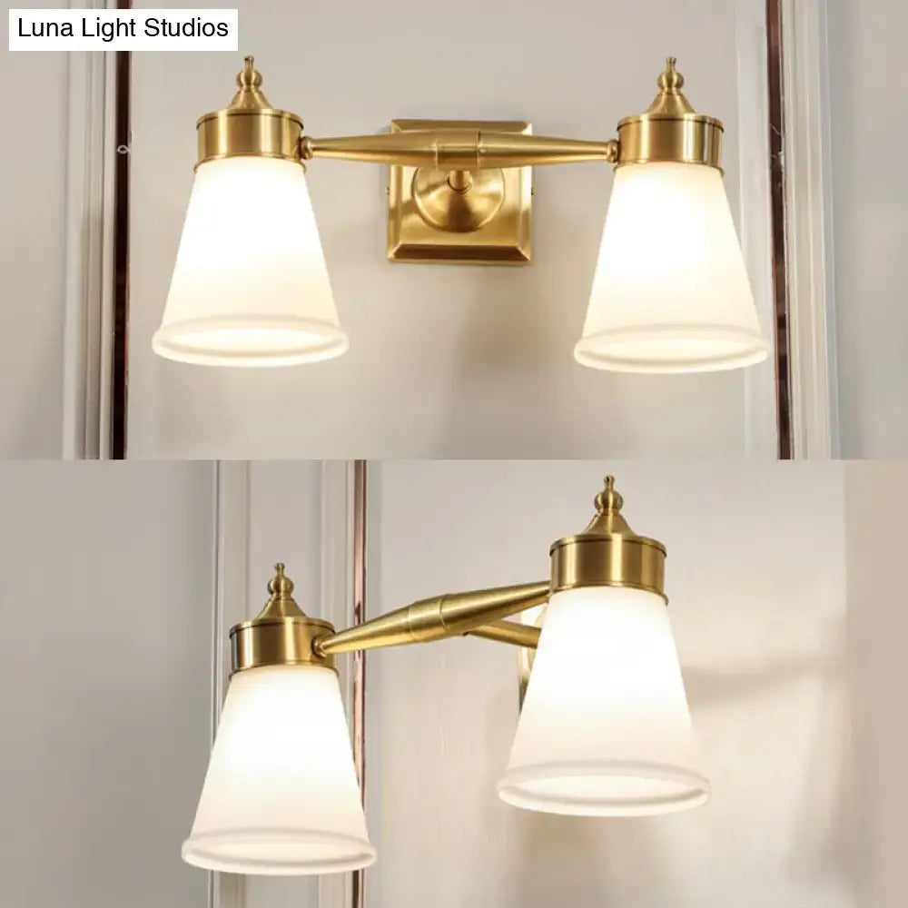 Brass cream glass vanity light, Decorbites dual-light fixture with frosted shades on Tampa Home & Garden Store