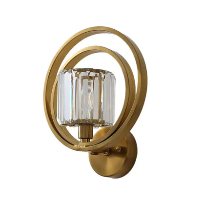 Brass crystal drum sconce with circular gold frame and crystal shade by Decorbites on Tampa Home & Garden Store