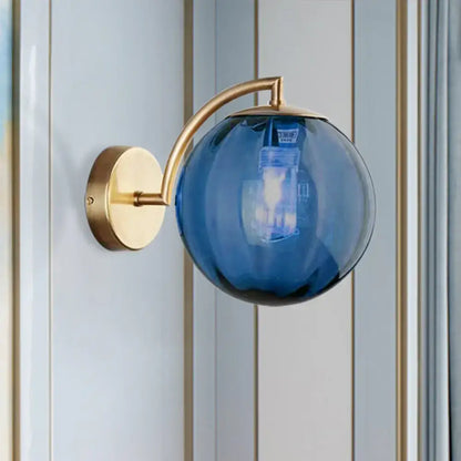 Brass wall sconce with blue glass ball, single-light head by Decorbites on Tampa Home & Garden Store