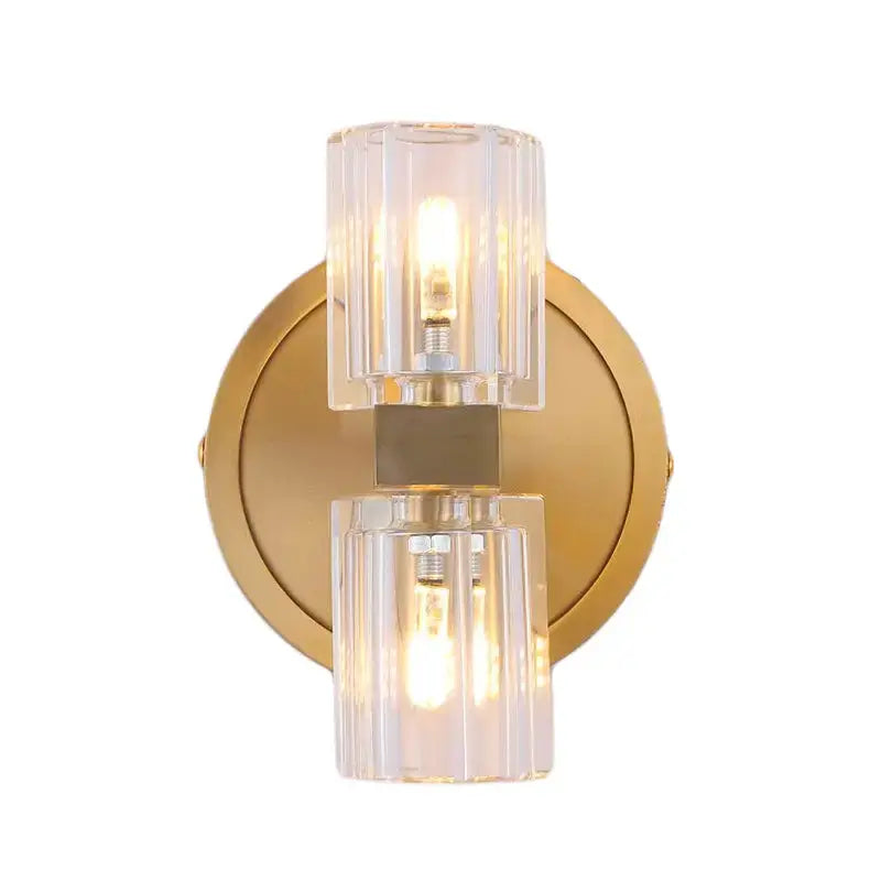 Postmodern brass wall light by Decorbites, two-light bedroom fixture with crystal shade cylinders on Tampa Home & Garden Store