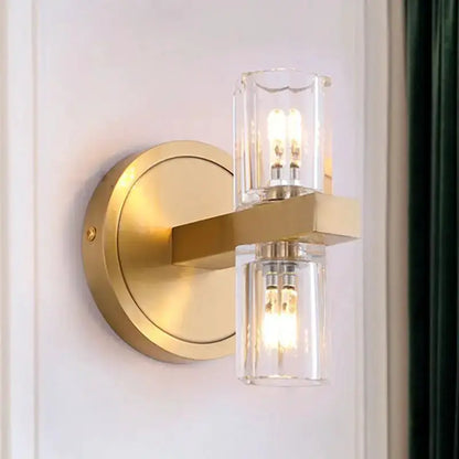 Wall light brass finish with crystal glass shade cylinders and dual bulbs on Tampa Home & Garden Store