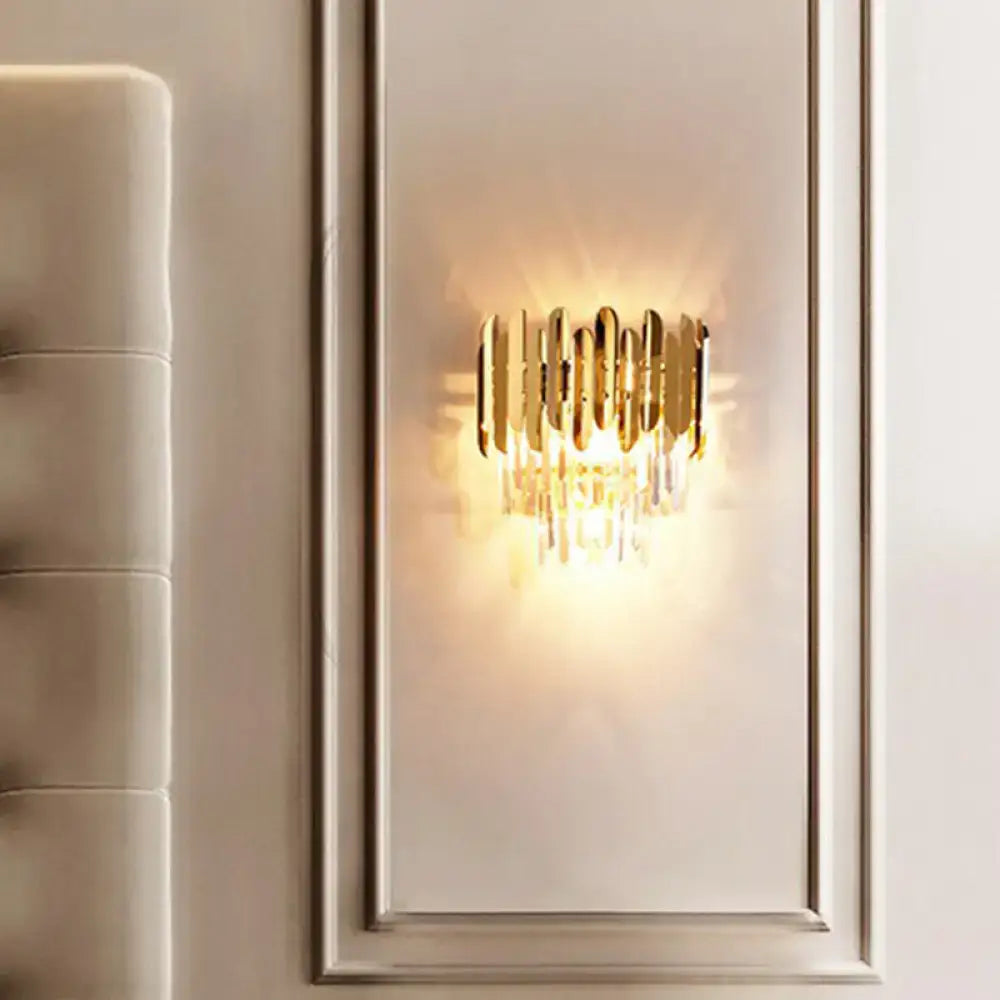 Crystal brass flush sconce by Decorbites with gold finish and crystal prisms on wall on Tampa Home & Garden Store