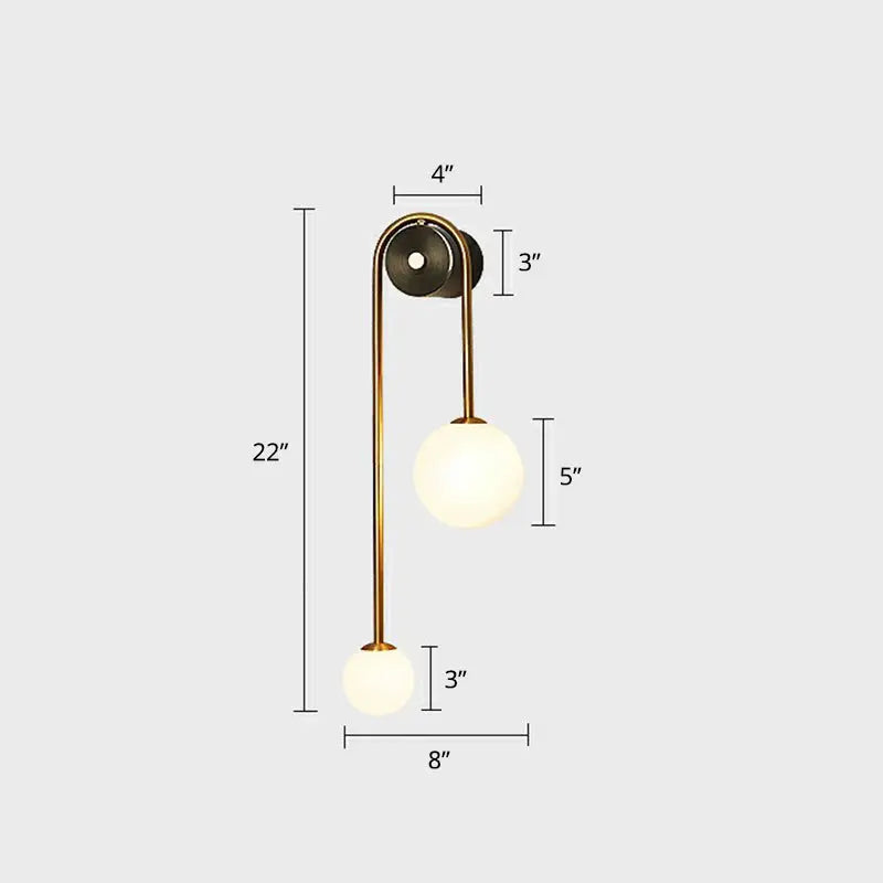 Brass opal glass wall sconce by Decorbites with two-globe design in gold finish on Tampa Home & Garden Store