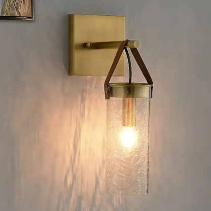Brass Crack Glass Sconce by Decorbites with crackled glass shade and leather straps on Tampa Home & Garden Store