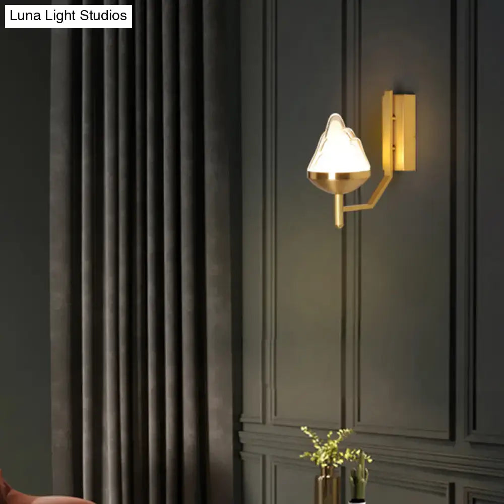 Brass geometric glass sconce, wall-mounted with warm glow, Decorbites on Tampa Home & Garden Store