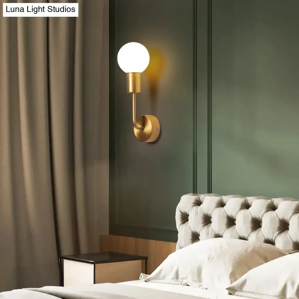 Brass geometric glass wall sconce with round globe Decorbites ideal bedroom lighting on Tampa Home & Garden Store
