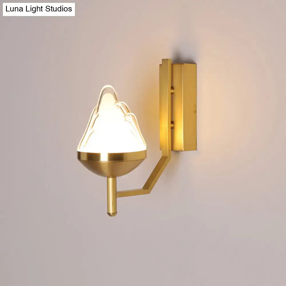 Brass geometric glass wall sconce with frosted shade and angular arm by Decorbites on Tampa Home & Garden Store