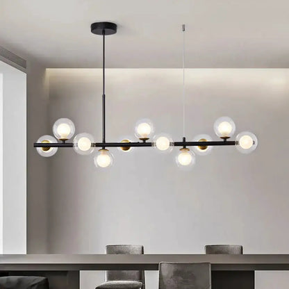 Decorbites postmodern glass ball pendant light with brass bar and frosted glass globes on Tampa Home & Garden Store