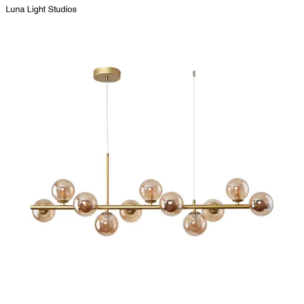 Postmodern glass ball pendant light with brass rod and frosted glass globes Decorbites on Tampa Home & Garden Store