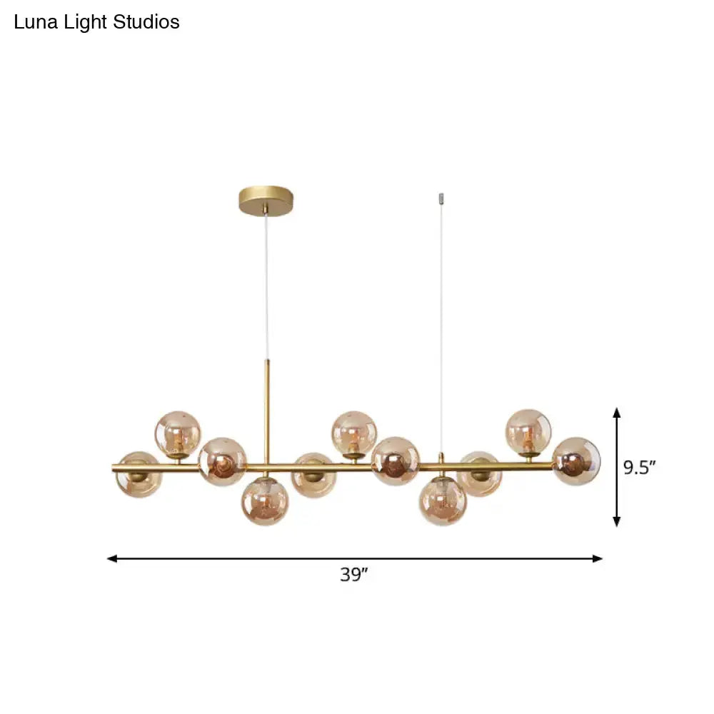 Decorbites brass glass ball pendant chandelier for kitchen with frosted globes, 39in wide on Tampa Home & Garden Store