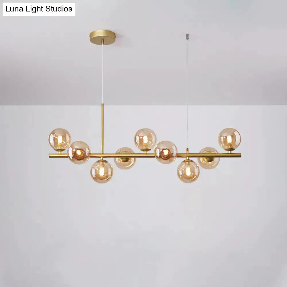 Postmodern brass glass ball pendant light with frosted amber glass globes, Decorbites on Tampa Home & Garden Store