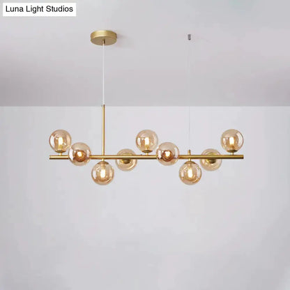 Postmodern brass glass ball pendant light with frosted amber glass globes, Decorbites on Tampa Home & Garden Store