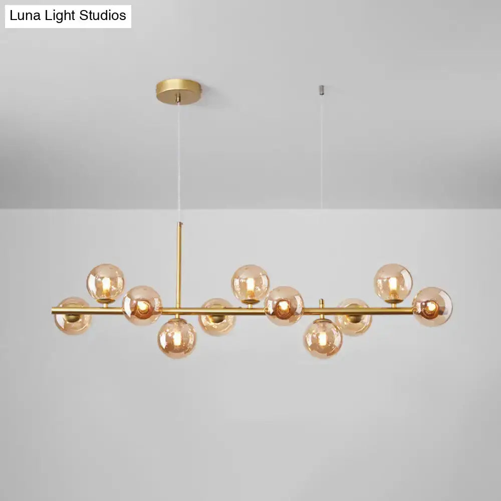 Decorbites postmodern glass ball pendant light with brass finish and frosted glass spheres on Tampa Home & Garden Store