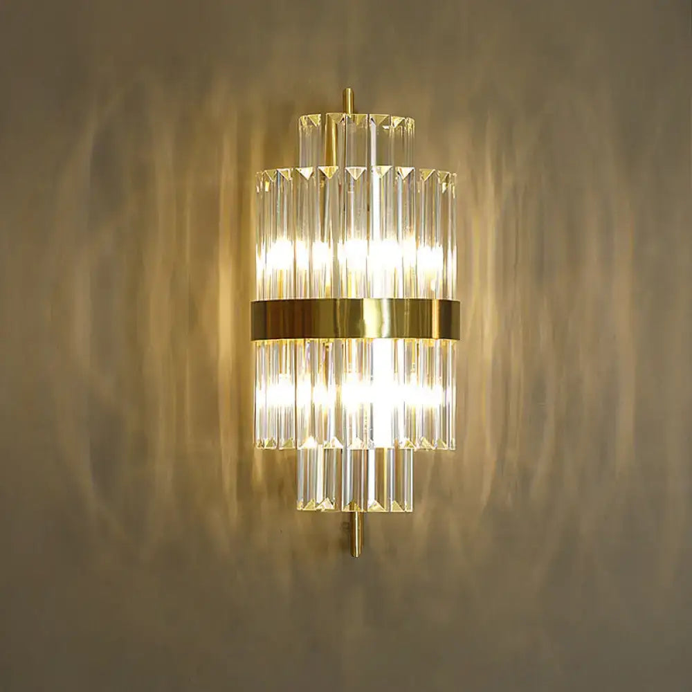 Decorbites gold crystal wall sconce with two LED bulbs, vertical prisms, gold band accent on Tampa Home & Garden Store