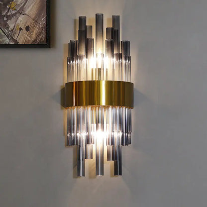 Brass gray cylinder light fluted two-light wall sconce by Decorbites with glass tube prisms on Tampa Home & Garden Store