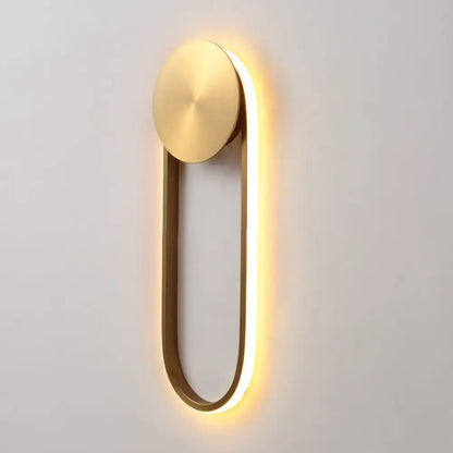 Brass Arc Wall Lamp by Decorbites with warm LED glow along a rounded U-shaped brass frame on Tampa Home & Garden Store