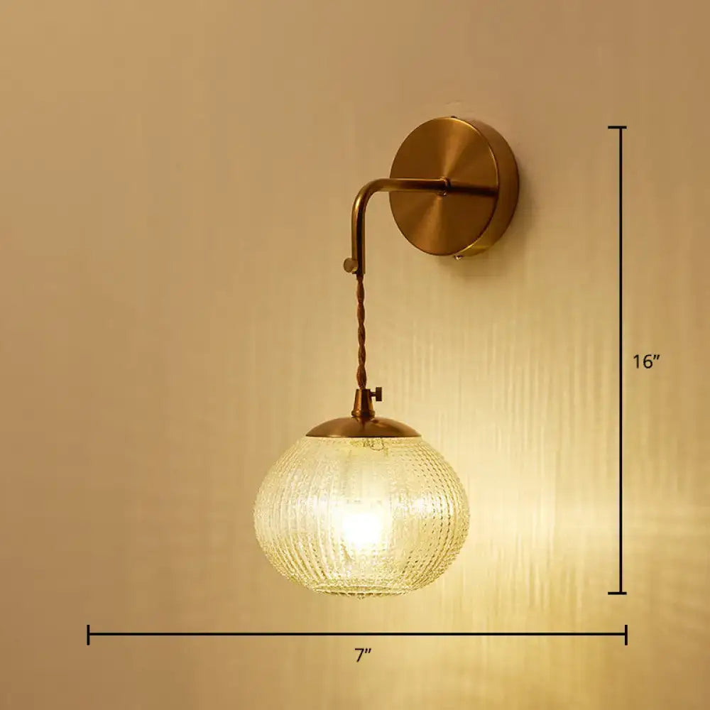 Decorbites gold textured glass ball wall sconce with brass arm, mount 7in wide x 16in tall on Tampa Home & Garden Store
