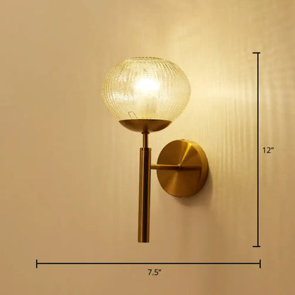 Gold textured glass ball wall sconce with brass mount, 12in tall, 7.5in wide on Tampa Home & Garden Store