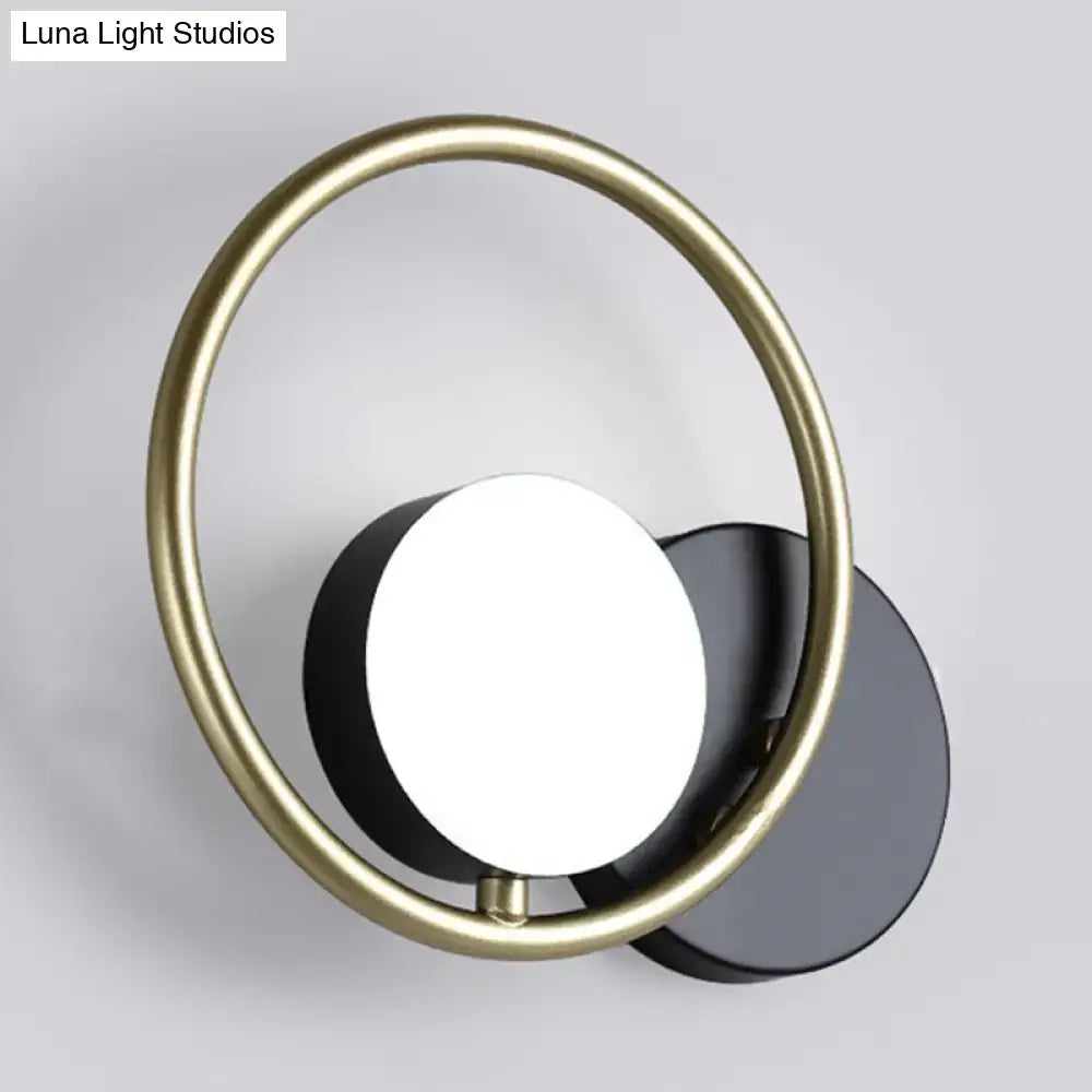 Gold Black Ring Industrial Sconce with white globe and black backplate by Decorbites on Tampa Home & Garden Store
