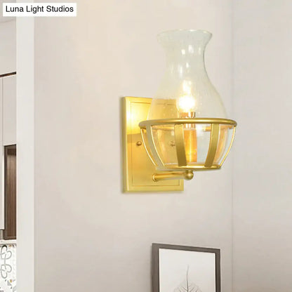 Gold Clear Glass Wall Lamp by Decorbites; brass wall mount with open cage shade on Tampa Home & Garden Store