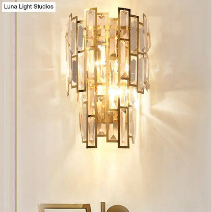 Gold crystal curved wall sconce with geometric crystal panels by Decorbites on Tampa Home & Garden Store
