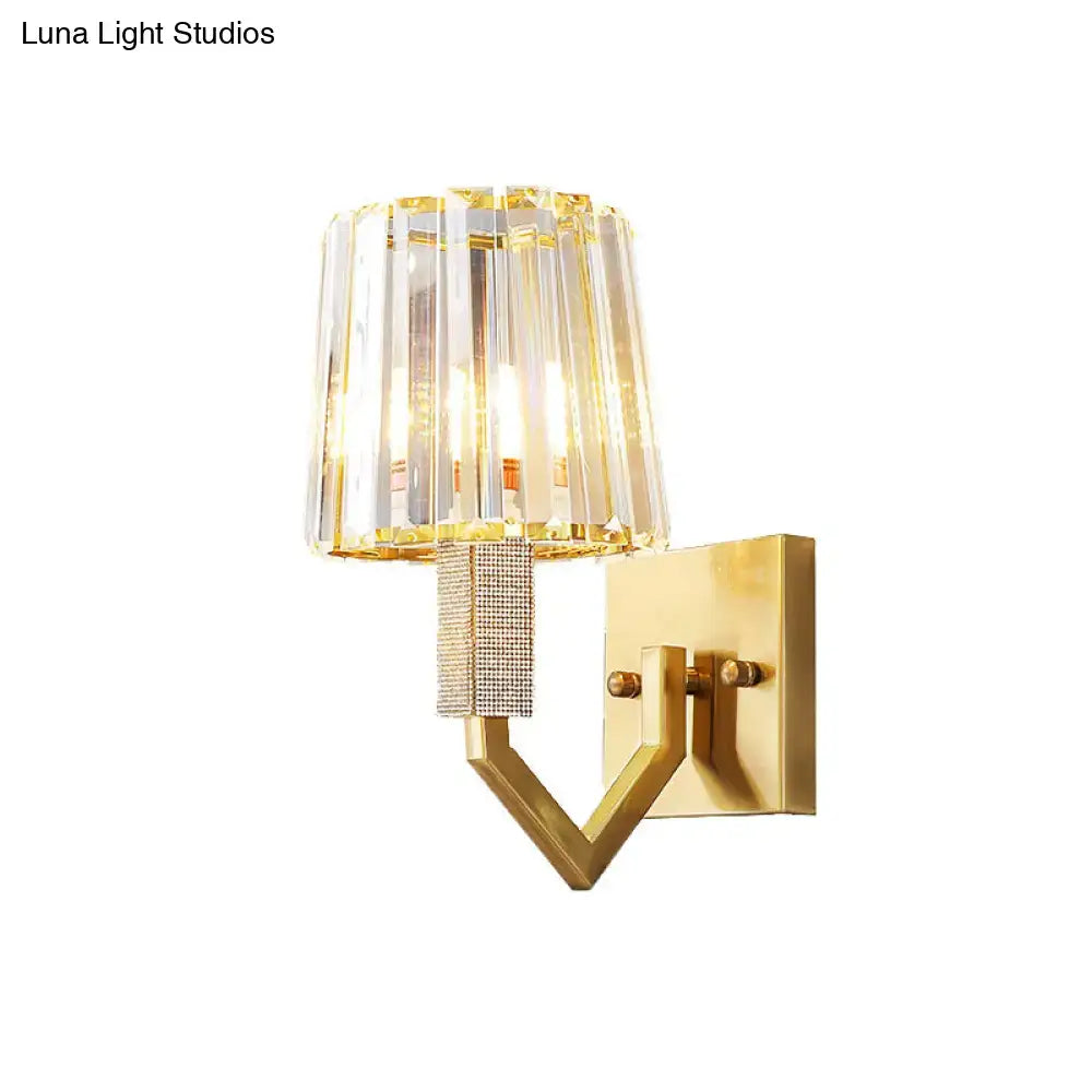 Gold crystal prism wall light sconce with a V-shaped arm and crystal shade by Decorbites on Tampa Home & Garden Store