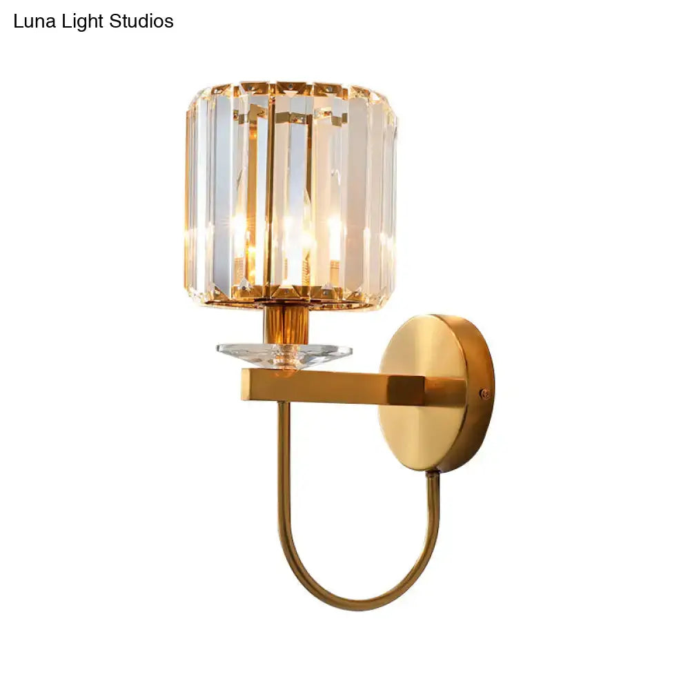 Gold crystal curved-arm wall sconce with clear crystal shade on Tampa Home & Garden Store