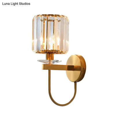 Gold crystal curved-arm wall sconce with clear crystal shade on Tampa Home & Garden Store
