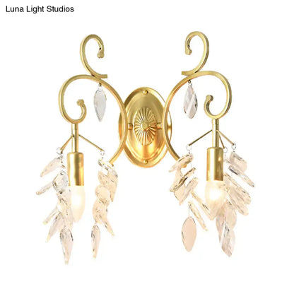 Gold Curve Crystal Sconce with dual gold scroll arms and hanging crystals, Decorbites on Tampa Home & Garden Store