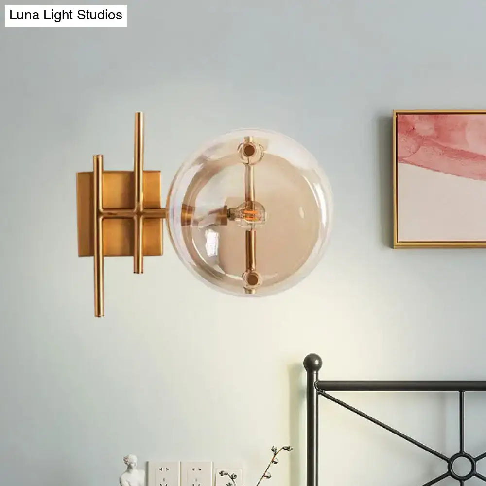 Gold double ball glass sconce with brass finish and clear globe, wall-mounted by Decorbites on Tampa Home & Garden Store