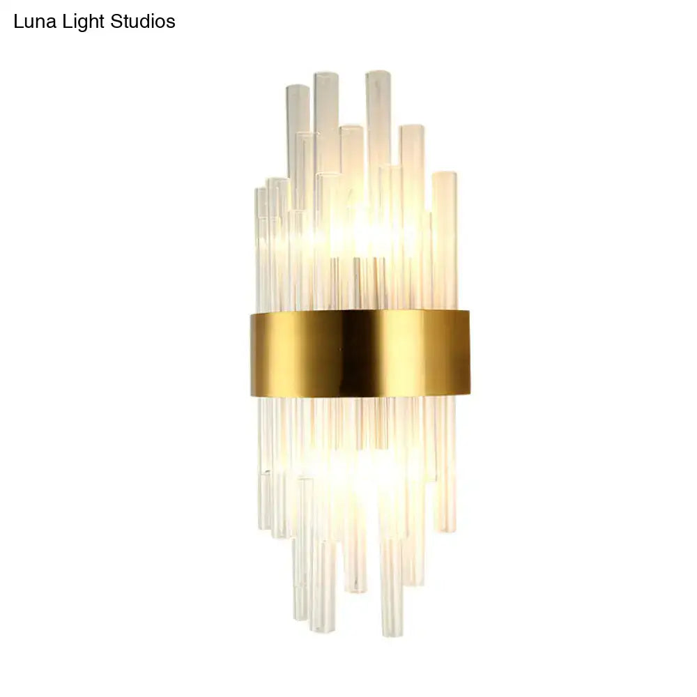 Gold Fluted Crystal Sconce by Decorbites with brass band and crystal rods, wall-mounted on Tampa Home & Garden Store