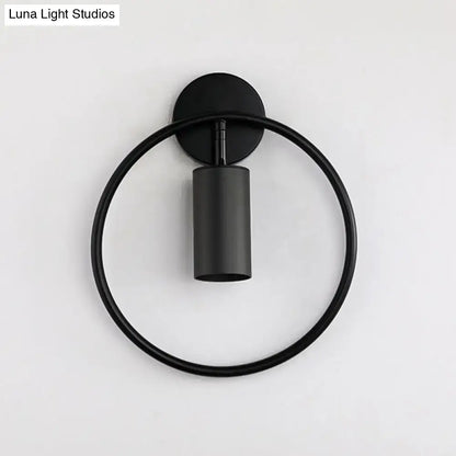 Gold Halo Ring Wall Sconce black circular halo with cylindrical shade on wall Decorbites on Tampa Home & Garden Store