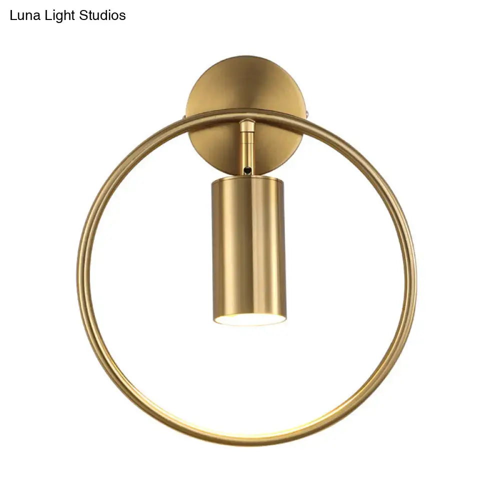 Gold halo ring wall sconce with brass finish and cylindrical lamp holder on Tampa Home & Garden Store