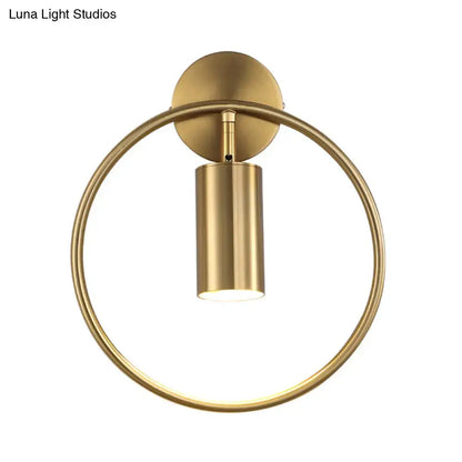 Gold halo ring wall sconce with brass finish and cylindrical lamp holder on Tampa Home & Garden Store