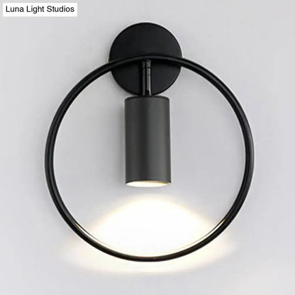 Gold Halo Ring Wall Sconce with black circular ring and gray cylindrical shade on Tampa Home & Garden Store