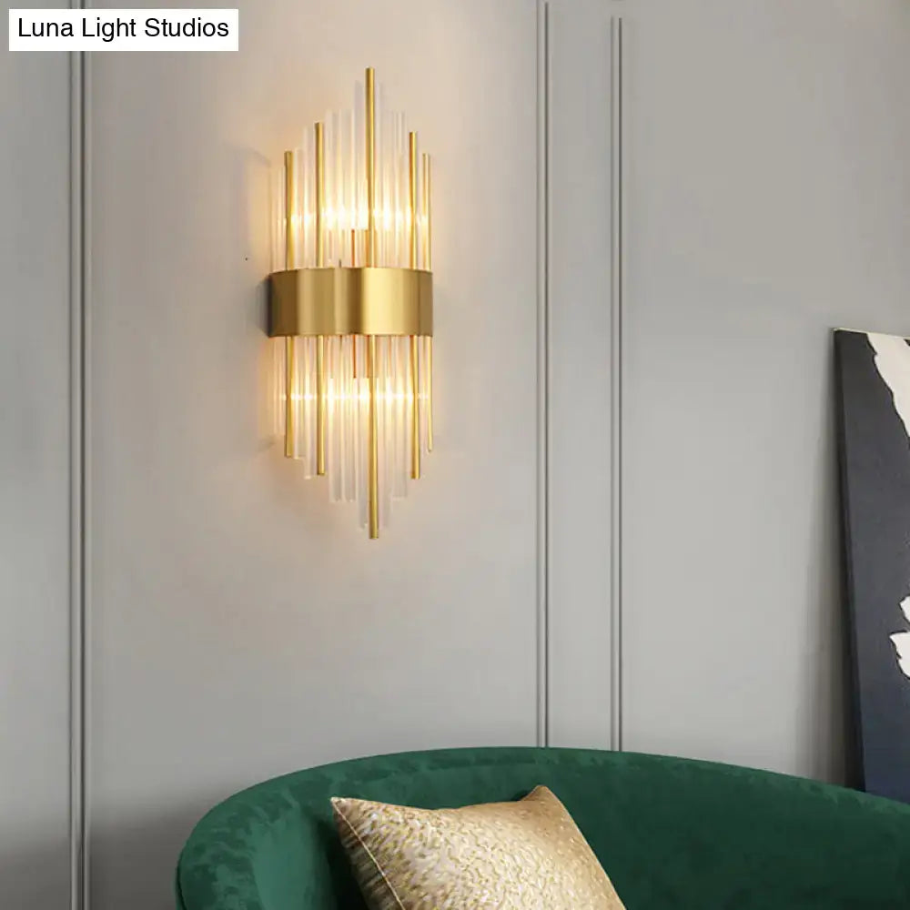 Gold K9 crystal rod dual-light sconce by Decorbites with vertical crystal rods and gold band on wall on Tampa Home & Garden Store